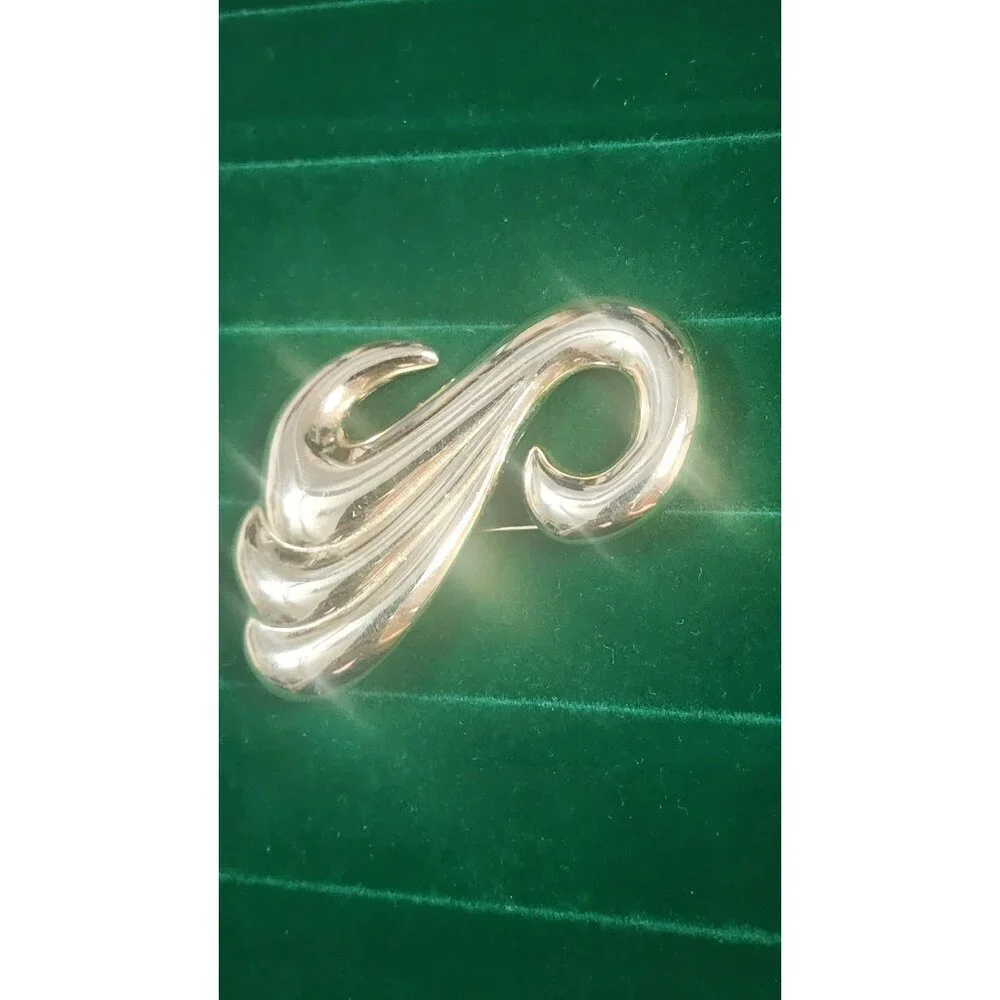 Vintage 80s gold tone sculptural swirl brooch large abstract high polish
